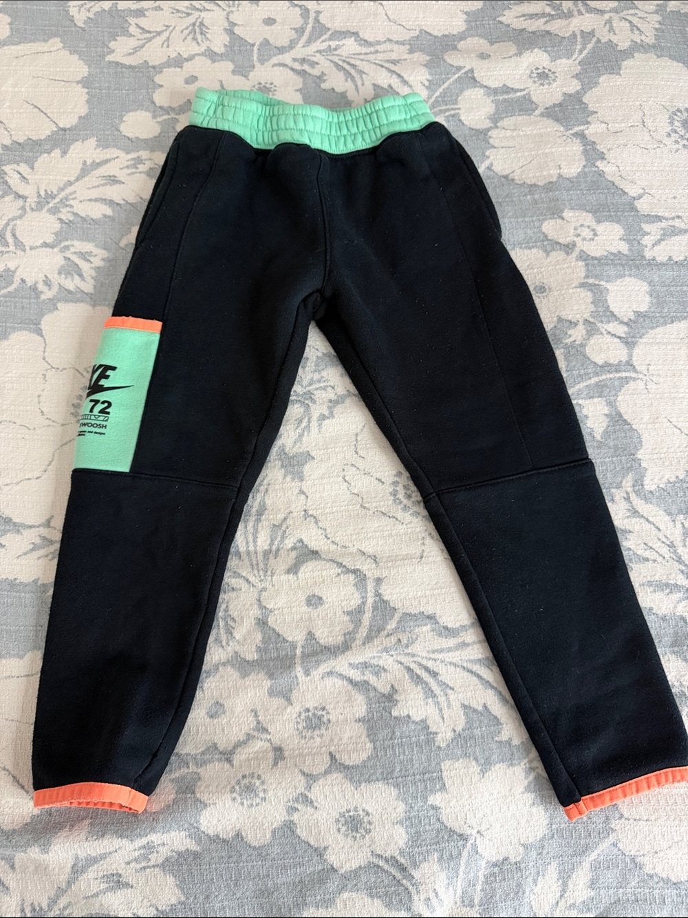 Nike Kids Black Joggers with Mint Waistband and Coral Accents